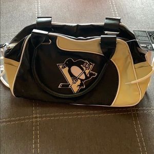 With tags Penguins Purse